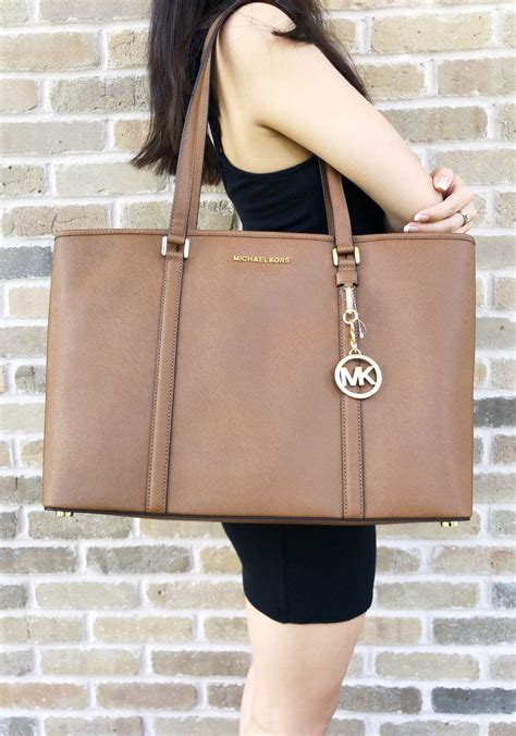 replica michael kors laptop bag womens|Michael Kors laptop tote bag.